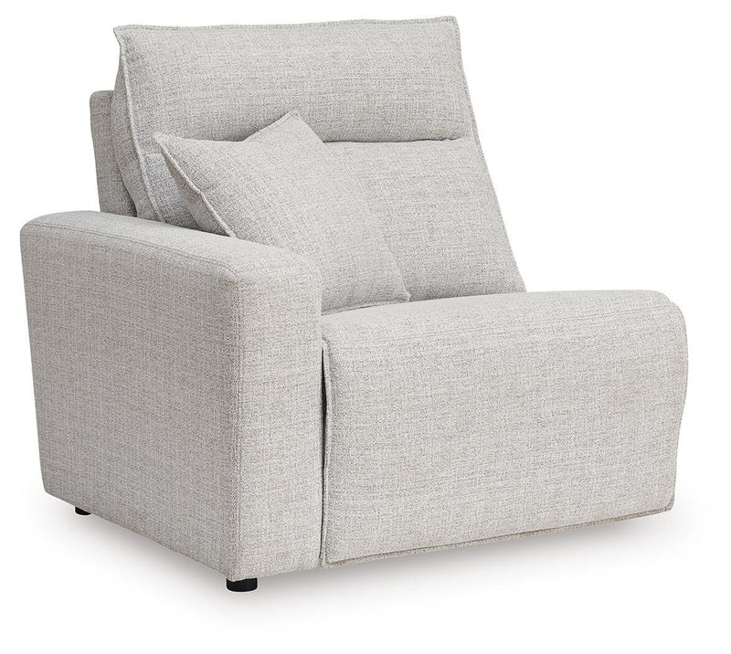Ashley Furniture Modmax II power reclining sectional with built-in audio consoles, shown from an angled view in a modern living room.