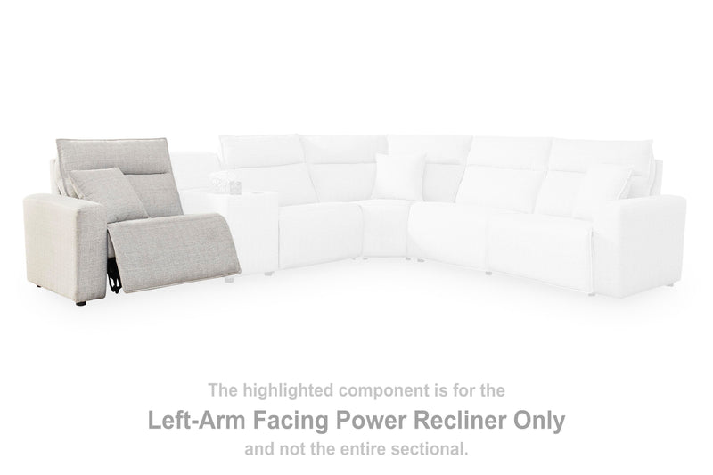 Ashley Furniture Modmax II power reclining sectional with built-in audio consoles, featuring plush upholstery and modern design.