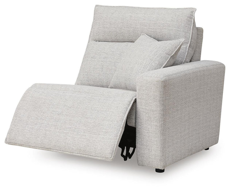 Ashley Furniture Modmax II power reclining sectional with audio consoles, shown from an angled open view highlighting seating and built-in tech