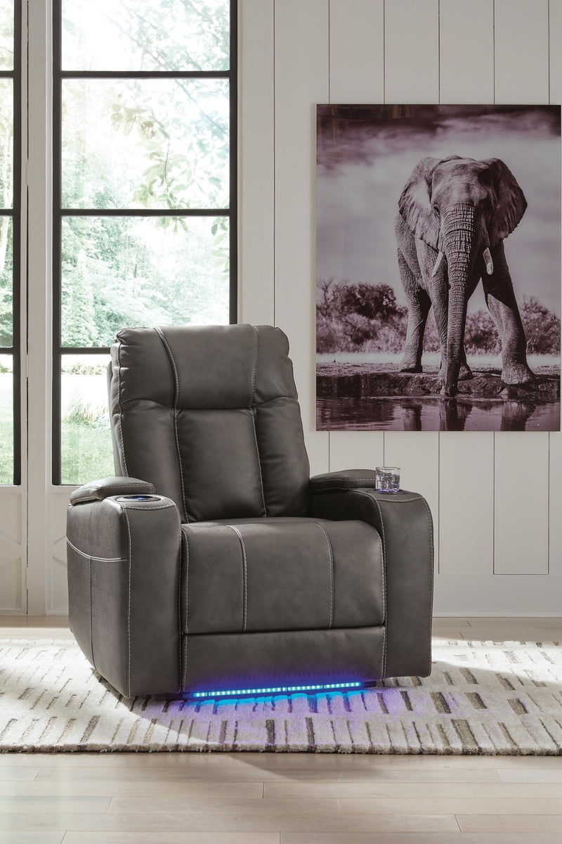 Ashley Furniture Feazada power recliner in closed position, with plush upholstery and padded armrests for comfortable seating.