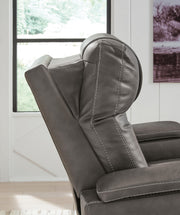 Ashley Furniture Feazada Power Recliner showing plush upholstery, padded armrests, and reclining mechanism.