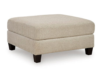 Ashley Furniture Steelwater Retreat living room set with sofa and armchair, featuring neutral upholstery and contemporary design.
