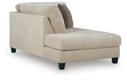 Ashley Furniture Steelwater Retreat sectional with chaise, showing plush fabric upholstery and modern design from an angled view.