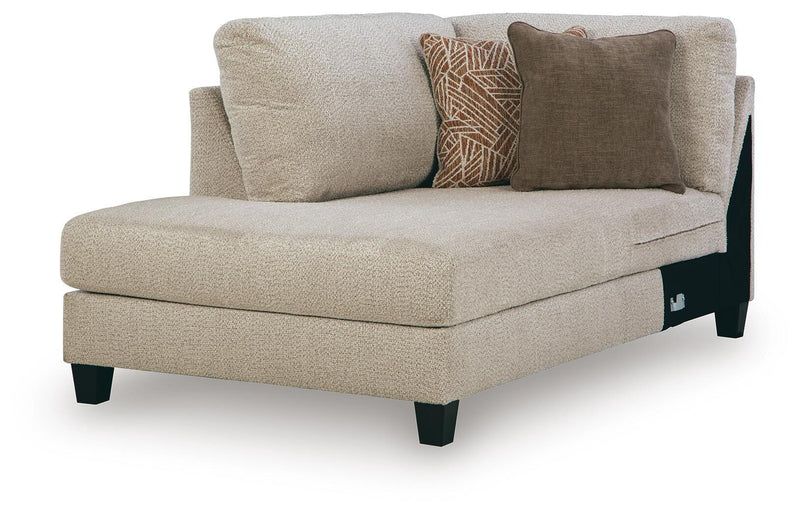 Ashley Furniture Steelwater Retreat sectional with chaise, showing a stylish fabric sectional sofa from an angled view.