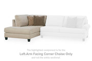 Ashley Furniture Steelwater Retreat sectional with chaise, showing plush fabric cushions and modern design in a spacious living room setting.