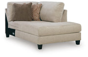 Ashley Furniture Steelwater Retreat sectional with chaise, showing a modern fabric sofa in a living room setting.