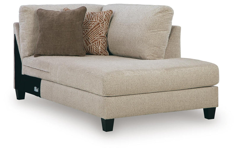 Ashley Furniture Steelwater Retreat sectional with chaise, showing a modern fabric sofa in a living room setting.