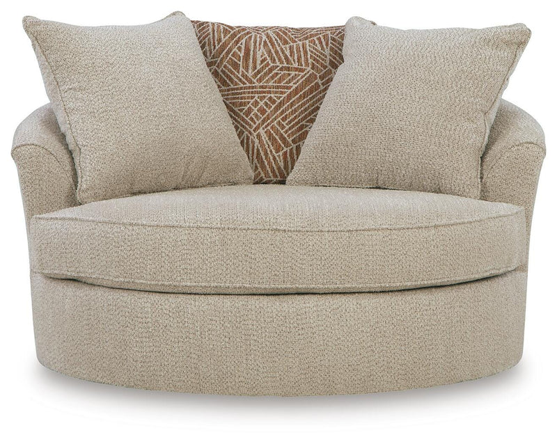 Ashley Furniture Steelwater Retreat oversized swivel accent chair with plush fabric and rounded armrests, shown from a head-on angle.