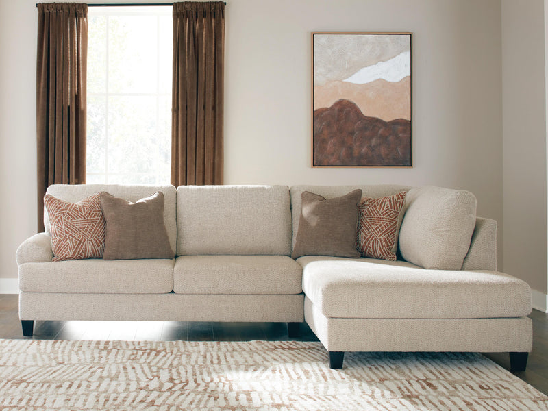 Ashley Furniture Steelwater Retreat living room set with a sofa, loveseat, and matching armchair in a cozy, modern design.