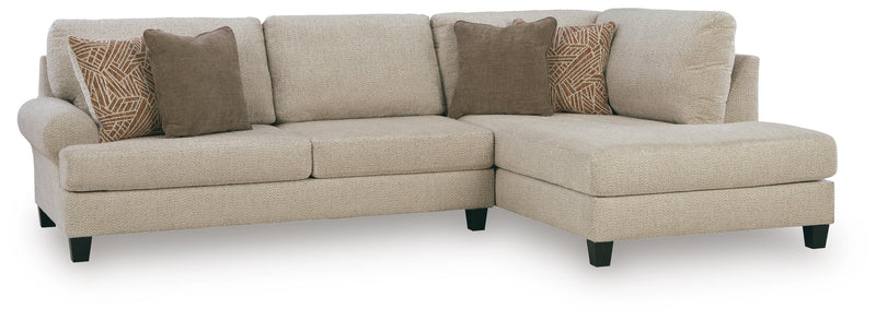 Ashley Furniture Steelwater Retreat living room set with sofa, loveseat, and armchair in a cozy, stylish living space.