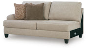 Ashley Furniture Steelwater Retreat sectional with chaise, showcasing plush fabric upholstery and modern design from an angled view.