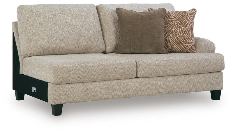 Ashley Furniture Steelwater Retreat sectional with chaise, showing the modern sectional sofa from a stylish angled view.