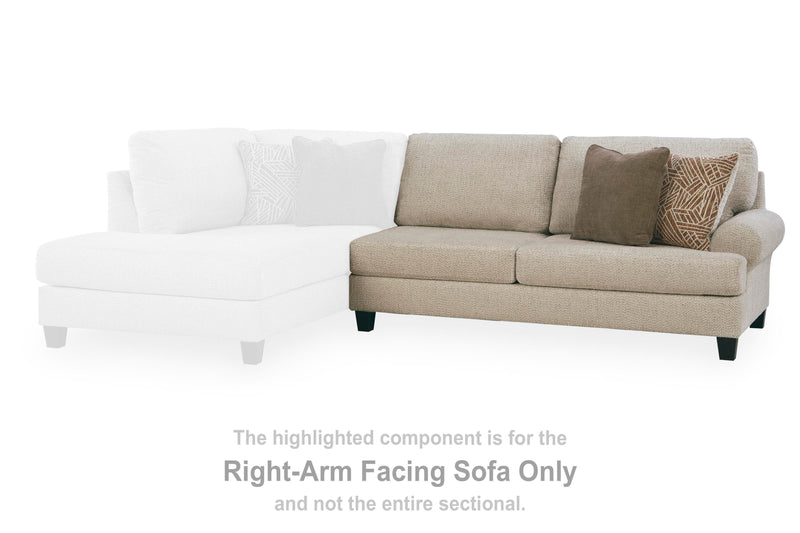Ashley Furniture Steelwater Retreat sectional with chaise, featuring plush upholstery and modern design for living room comfort.