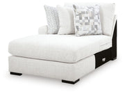 Ashley Furniture Misty-Lakes Super Chaise sectional with plush cushions and a sleek modern design, shown from an angled view.