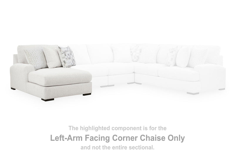 Ashley Furniture Misty-Lakes sectional with chaise, plush fabric and modern design, shown in a stylish living room setting.