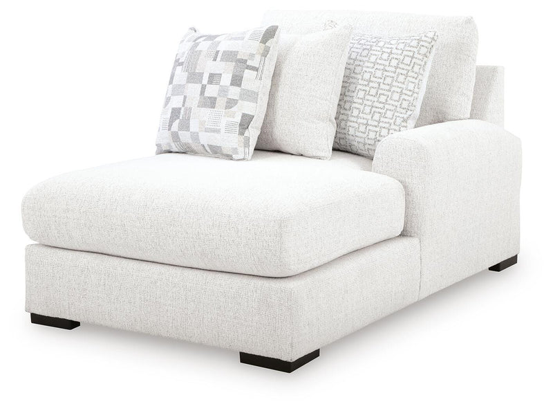 Ashley Furniture Misty-Lakes sectional with chaise, showing plush fabric upholstery and modern design from an angled perspective.