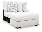 Ashley Furniture Misty-Lakes Super Chaise sectional with plush cushions and modern design, shown from an angled view.