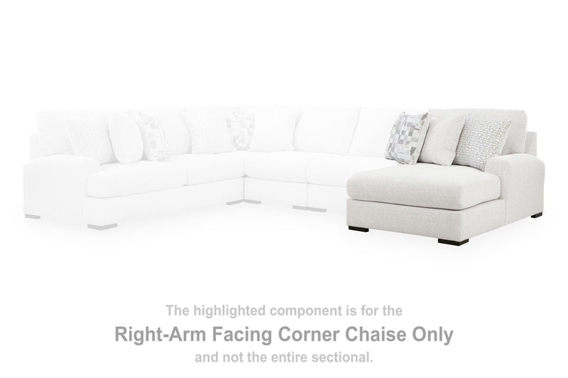 Misty-Lakes Super Chaise sectional sofa by Ashley Furniture in light fabric with plush cushions and modern design.