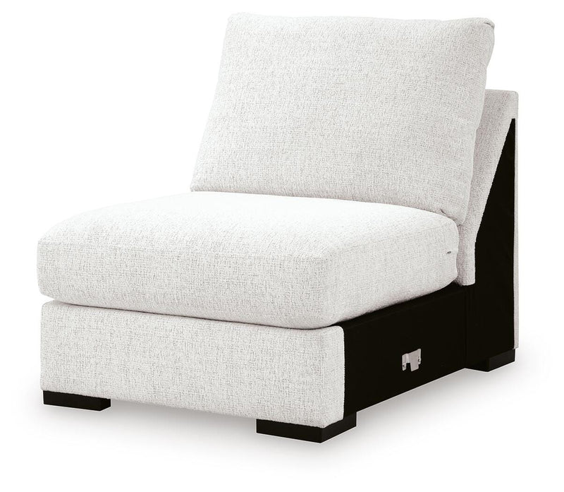 Ashley Furniture Misty-Lakes sectional with chaise, showing beige fabric upholstery and plush cushions from an angled view.