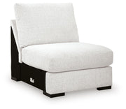 Ashley Furniture Misty-Lakes sectional with chaise, showing a modern fabric sectional sofa in a living room setting.