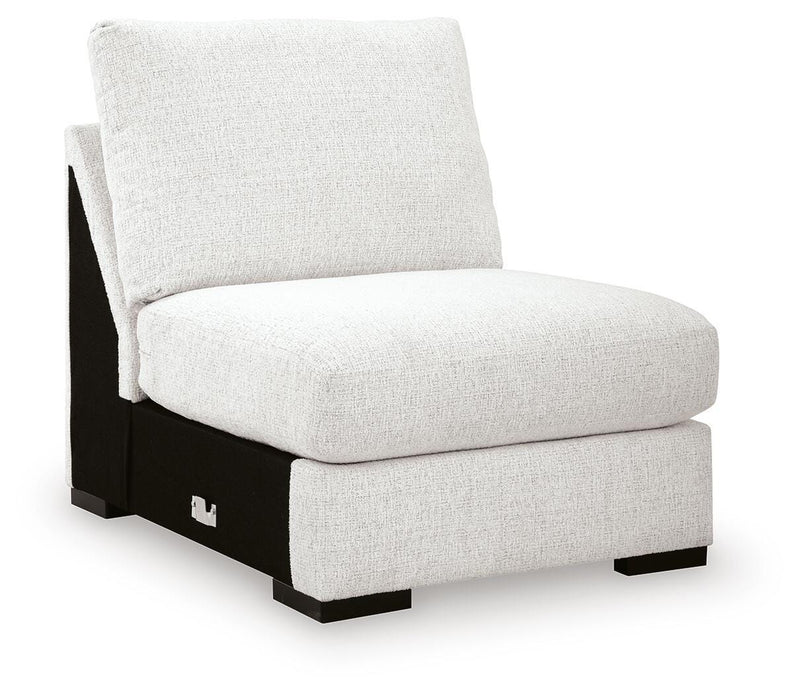 Ashley Furniture Misty-Lakes sectional with chaise, showing a modern fabric sectional sofa in a living room setting.