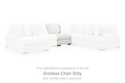 Ashley Furniture Misty-Lakes sectional with chaise, featuring plush upholstery and modern design in a cozy living room setting