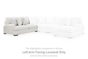 Ashley Furniture Misty-Lakes sectional with chaise, featuring neutral fabric and plush cushions in a modern living room setting.