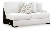 Ashley Furniture Misty-Lakes sectional with chaise, showing a cozy fabric sofa with a chaise lounge and modern design.