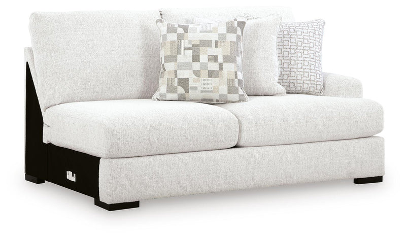 Ashley Furniture Misty-Lakes sectional with chaise, showing a cozy fabric sofa with a chaise lounge and modern design.