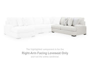 Ashley Furniture Misty-Lakes sectional with chaise, showing plush fabric upholstery and modern design in a cozy living room setting.