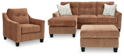 Ashley Furniture Amity Bay living room set with sofa and armchairs in neutral fabric, stylishly arranged in a modern living space.