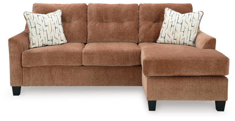 Ashley Furniture Amity Bay sofa chofa with right-facing chaise, upholstered in neutral fabric, shown from a head-on angle.