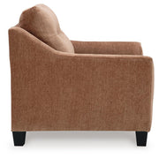 Ashley Furniture Amity Bay Chair with wooden legs and plush fabric upholstery, shown from the side.