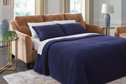 Ashley Furniture Amity Bay sofa chaise sleeper showing plush fabric, chaise lounge section, and convertible sleeper feature.