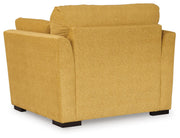 Ashley Furniture Keerwick living room set featuring a sectional sofa with plush cushions and modern design, seen from the back.