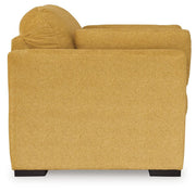 Ashley Furniture Keerwick living room set with sofa and armchair, featuring neutral upholstery and modern design.