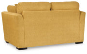 Ashley Furniture Keerwick living room set with sofa and armchair, featuring plush cushions and stylish upholstery.