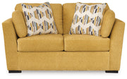 Ashley Furniture Keerwick living room set with sofa and loveseat, featuring plush cushions and modern design.