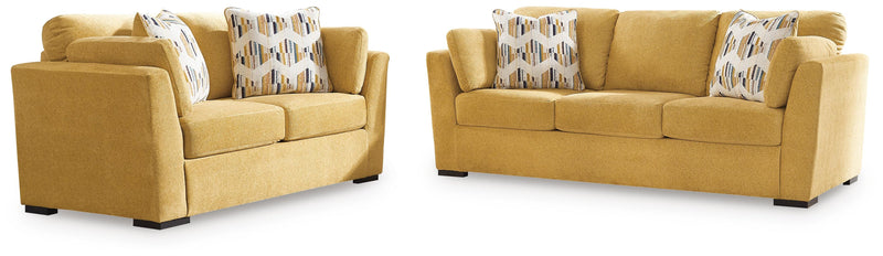 Ashley Furniture Keerwick living room set with fabric sofa and loveseat, modern design in neutral tones.