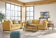 Ashley Furniture Keerwick living room set featuring a sofa, loveseat, and armchair with plush cushions and stylish fabric upholstery.