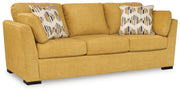 Ashley Furniture Keerwick sofa sleeper with fabric upholstery, angled view showing the convertible sleeper feature and cozy seating.