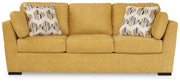 Ashley Furniture Keerwick living room set featuring a sofa and loveseat with plush cushions and modern design.