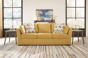 Ashley Furniture Keerwick living room set featuring a sofa, loveseat, and coffee table in a stylish modern design.