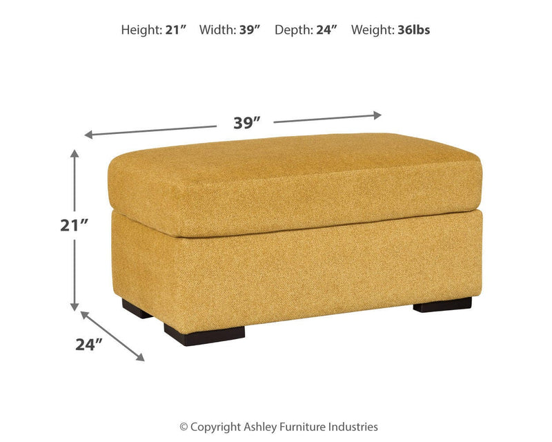 Ashley Furniture Keerwick living room set with sofa, loveseat, and armchair in a cozy, modern living room setting