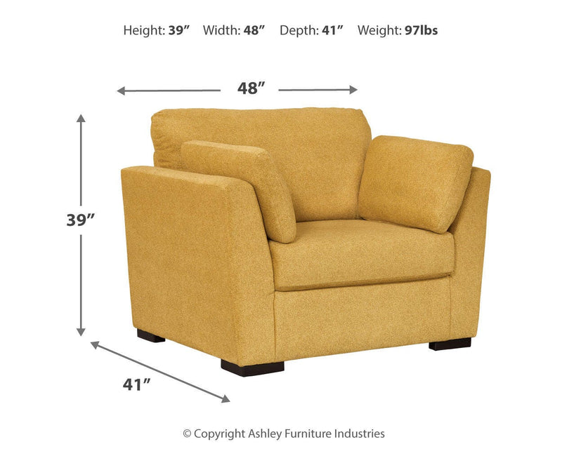 Ashley Furniture Keerwick living room set with sofa and armchair in a modern design, featuring neutral upholstery and plush cushions.