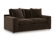 Ashley Furniture Maxton Heights loveseat shown from an angled view, featuring plush cushions and stylish upholstery.