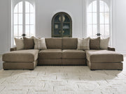 Ashley Furniture Camellia-Court double chaise sectional with plush cushions and modern design, shown in a stylish living room setting.