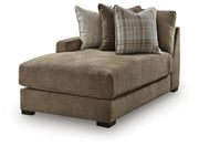 Ashley Furniture Camellia-Court double chaise sectional shown from an angled side view with plush cushions and a modern design.