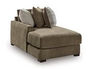 Ashley Furniture Camellia-Court sectional with chaise, showcasing modern fabric upholstery and spacious seating in an angled view.