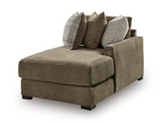 Ashley Furniture Camellia-Court sectional with chaise showing plush fabric, modern design, and spacious seating from an angled view.